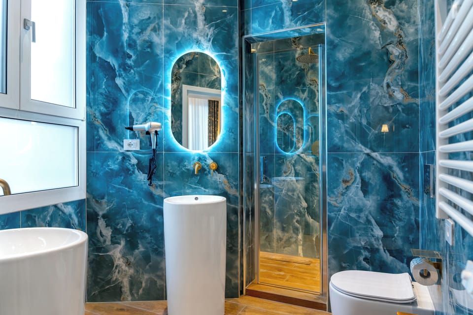 Comfort Quadruple Room | Bathroom | Shower, rainfall showerhead, hair dryer, bidet