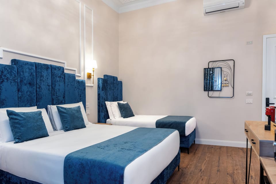 Comfort Triple Room | Down comforters, memory foam beds, minibar, in-room safe