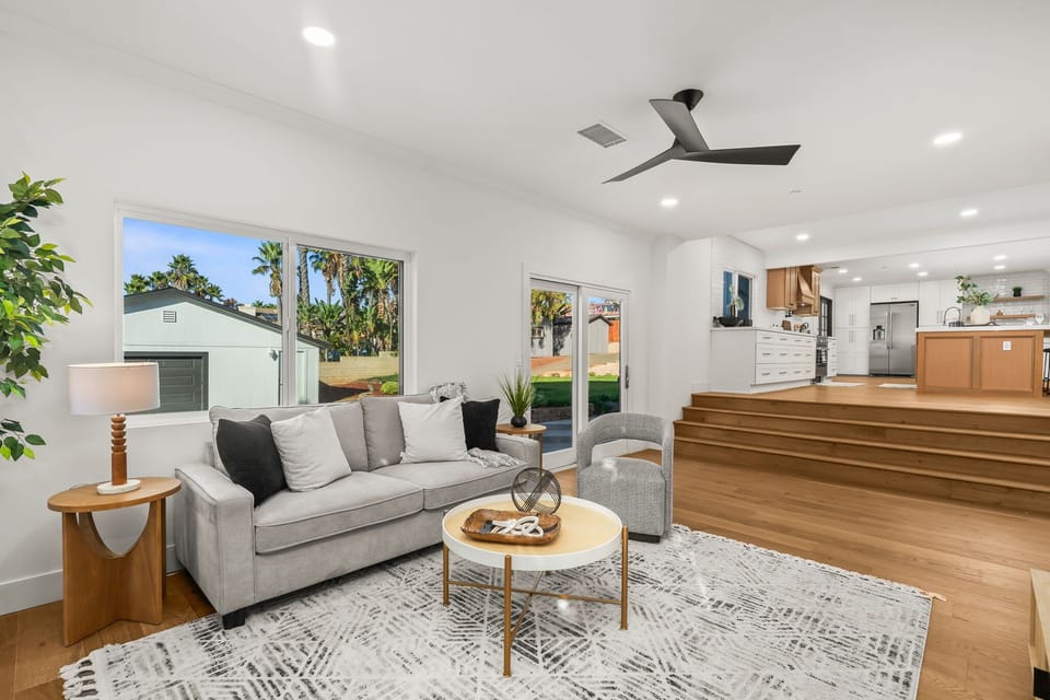 Comfortable lounge with smart TV and natural tones