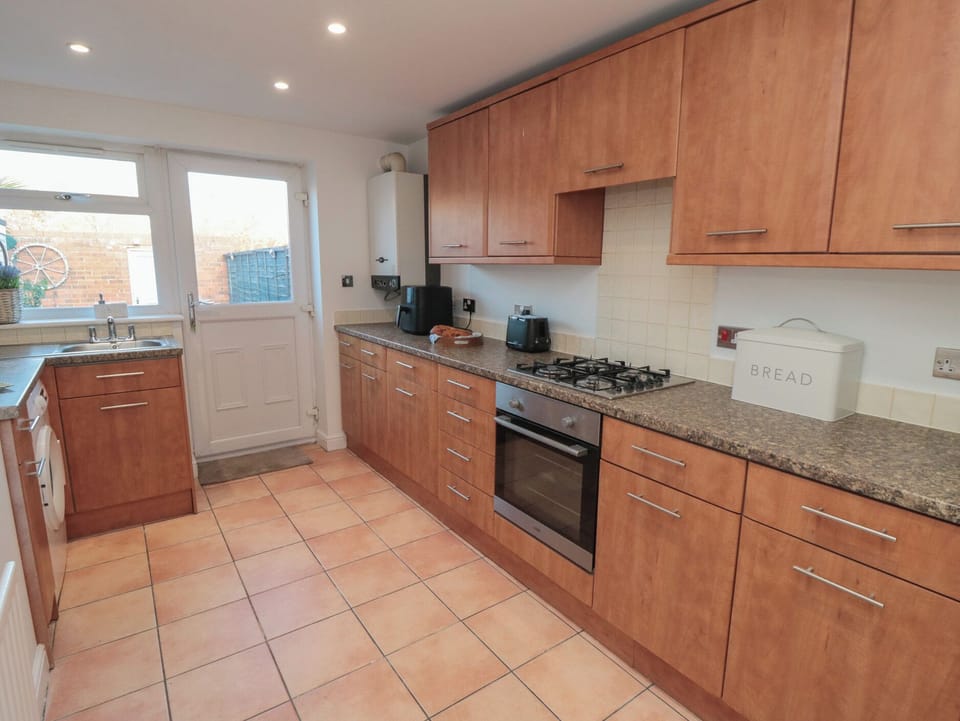 Fridge, microwave, toaster, cookware/dishes/utensils