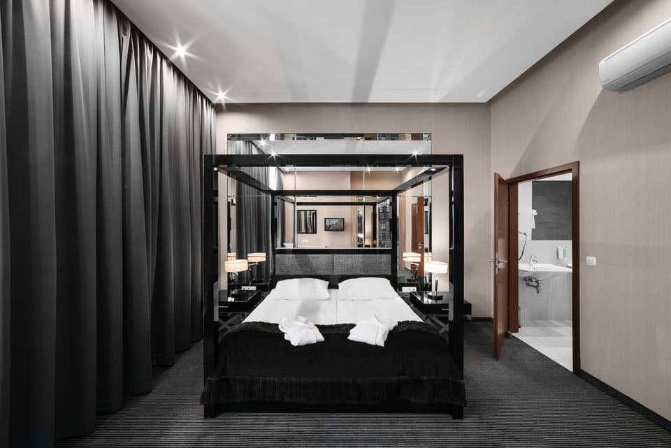 Apartment, 2 Bedrooms | Minibar, in-room safe, desk, iron/ironing board