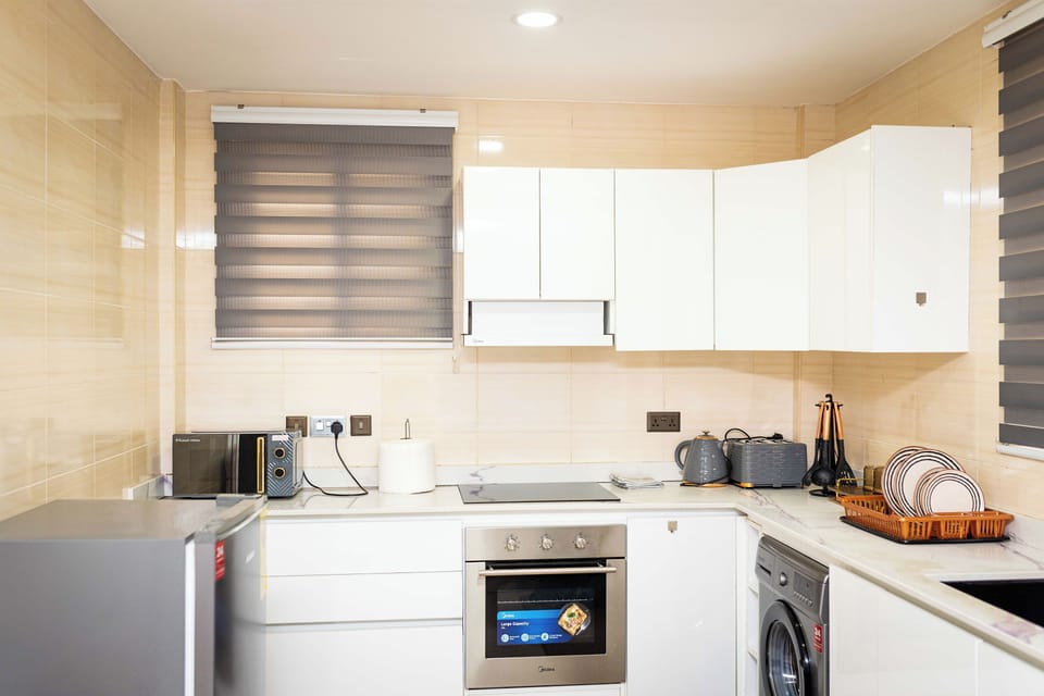 Deluxe Apartment, Balcony | Private kitchen | Electric kettle