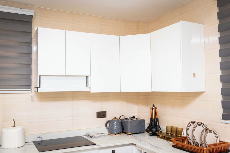 Deluxe Apartment, Balcony | Private kitchen | Electric kettle