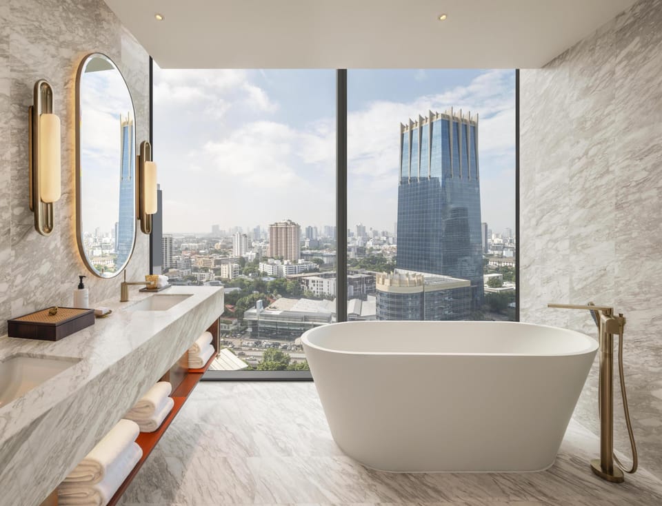 Designer toiletries, hair dryer, bathrobes, slippers