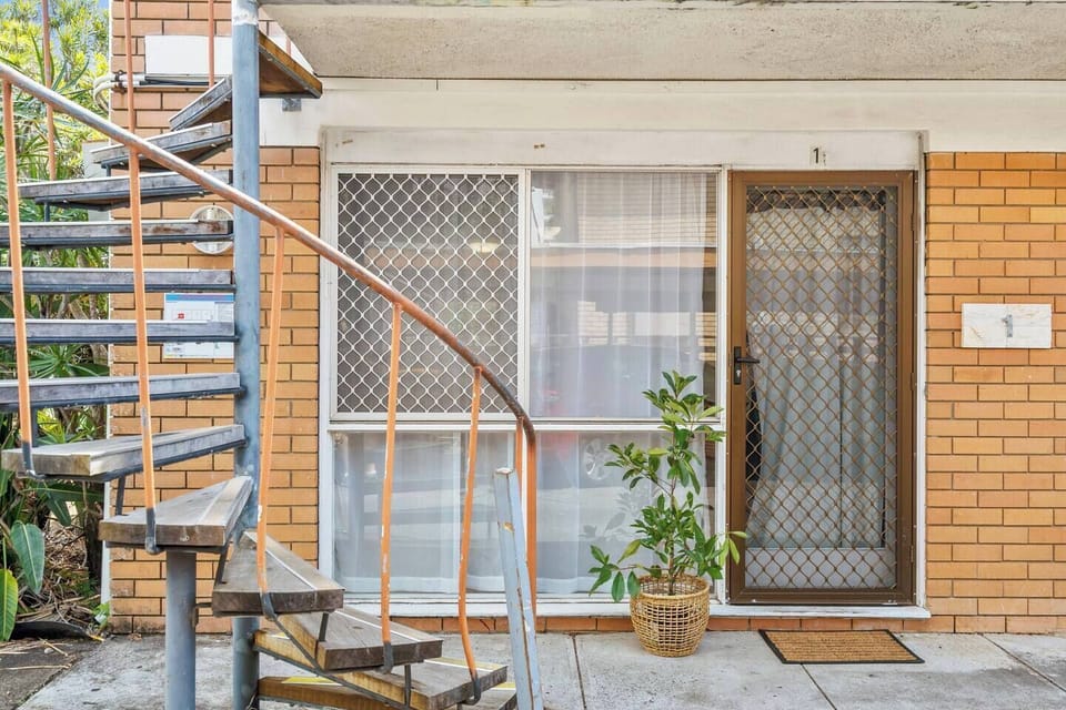 Enjoy easy ground-floor access with a private entry and convenient carport parking.