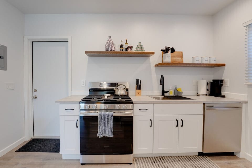 There kitchen has full size stainless steel appliances and everything you need to prepare a meal at home!