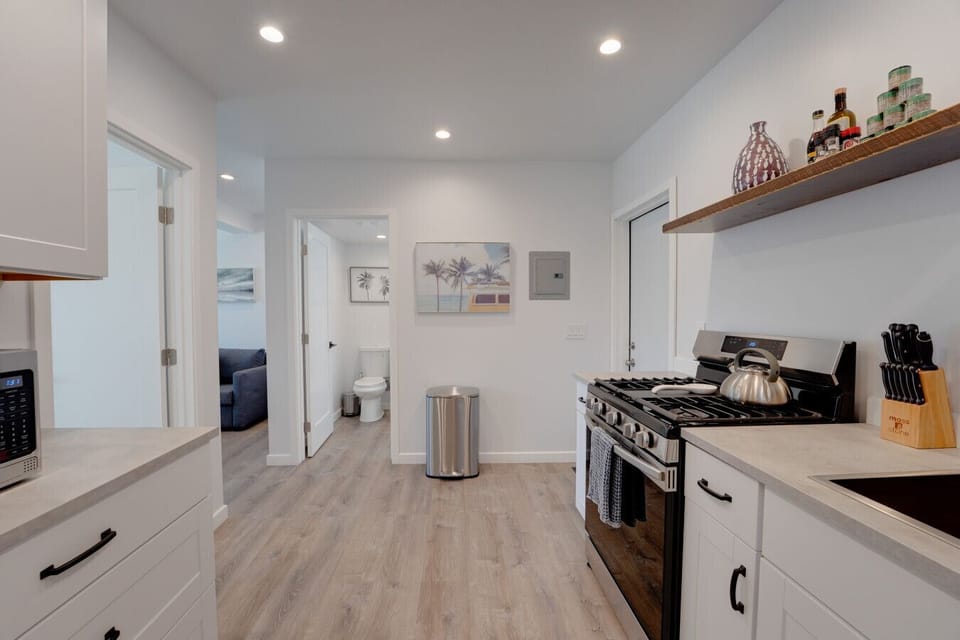 There kitchen has full size stainless steel appliances and everything you need to prepare a meal at home!