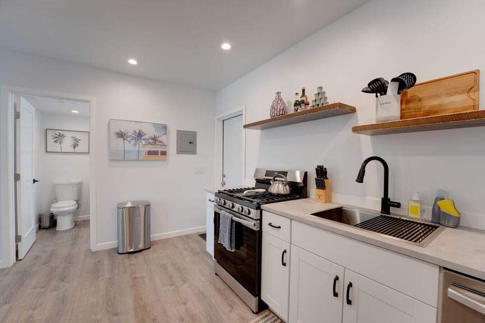 There kitchen has full size stainless steel appliances and everything you need to prepare a meal at home!