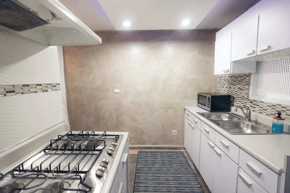 Apartment, Multiple Beds, Balcony, City View (A24803-BAY-CAYE) | Private kitchen