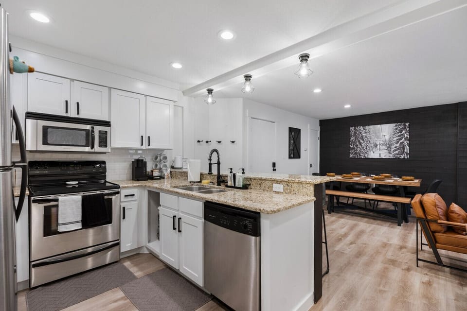 Kitchen & Dining Area: Modern appliances meet rustic charm for delightful meals and gatherings!