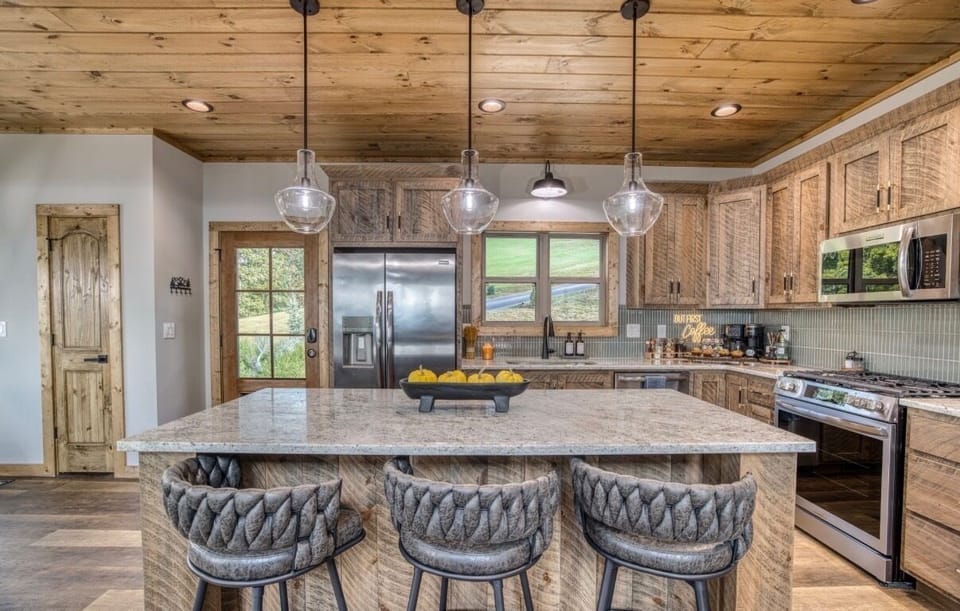 Fully stocked kitchen with a large island perfect for gathering