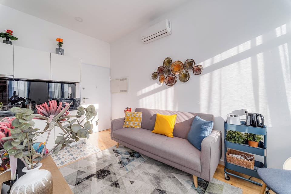 Basic Apartment, Balcony, City View | Living area | 32-inch LCD TV with cable channels