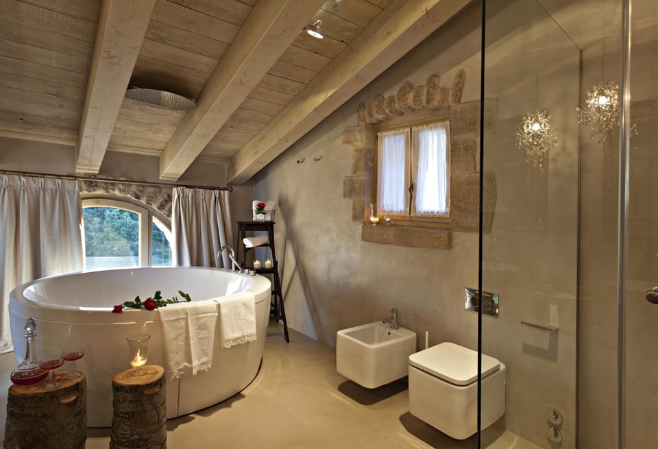 Suite | Bathroom | Separate tub and shower, designer toiletries, hair dryer, bathrobes