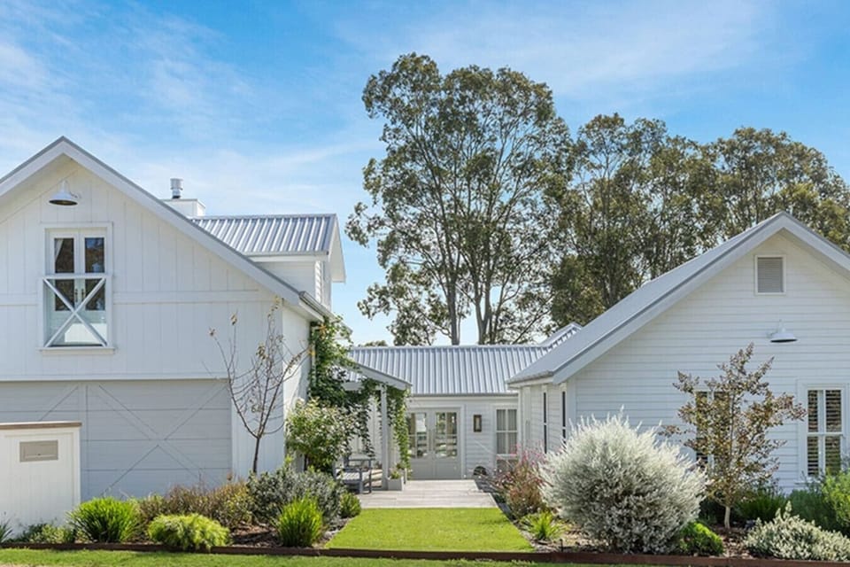 Four bedrooms, three bathrooms and multiple outdoor living areas, separate private loft retreat with King bed, gas log fireplace and twin rainfall shower, TV and workspace. Fully fenced with ample secure yard space for pets, and seasonally heated pool.