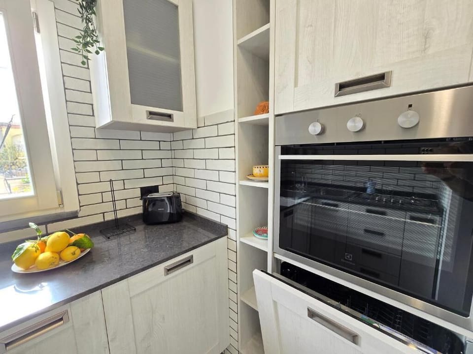 Luxury Duplex, City View | Private kitchen | Fridge, microwave, oven, stovetop