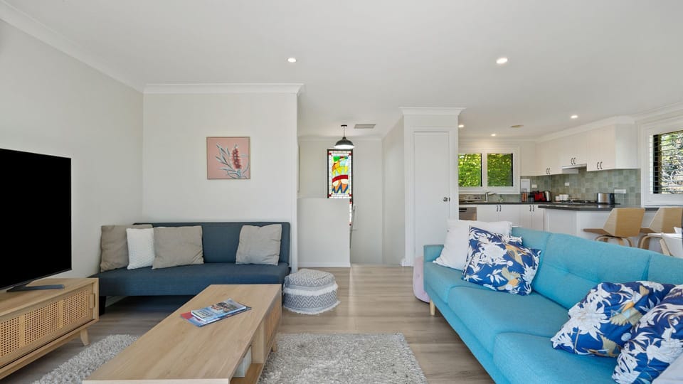 Spacious living zone flowing into the kitchen and dining area