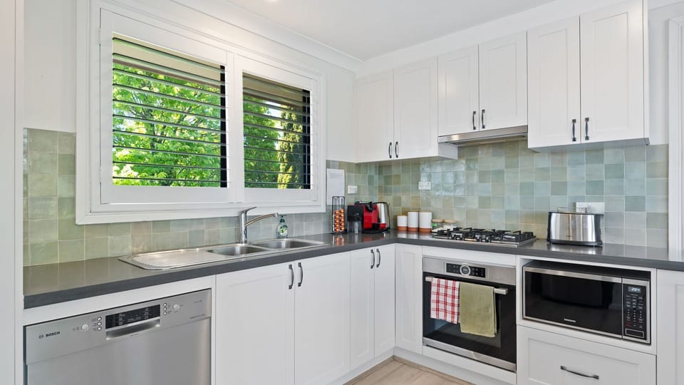 Modern kitchen with stainless steel appliances