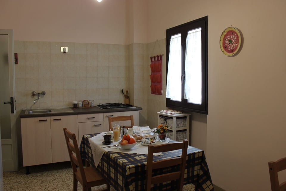 Double Room (External Private Bathroom) | Private kitchen | Fridge, stovetop