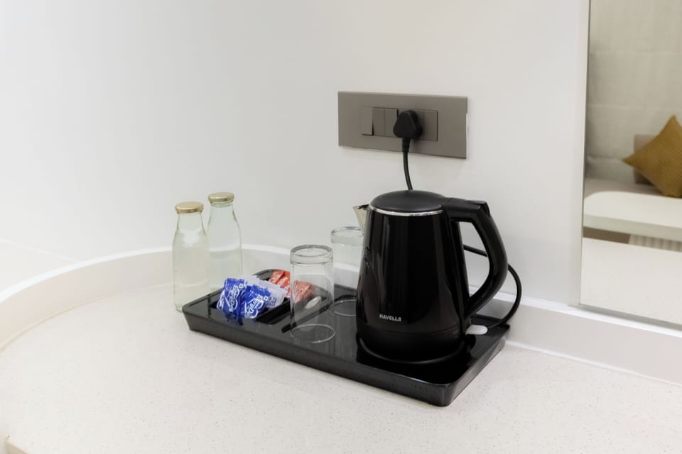 Junior Suite, City View | Desk, laptop workspace, iron/ironing board, free WiFi