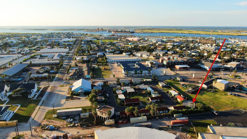 Get a bird’s-eye view of the neighborhood, with an arrow highlighting the perfect spot where your getaway awaits.