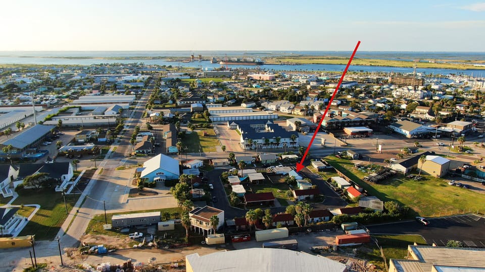 Get a bird’s-eye view of the neighborhood, with an arrow highlighting the perfect spot where your getaway awaits.