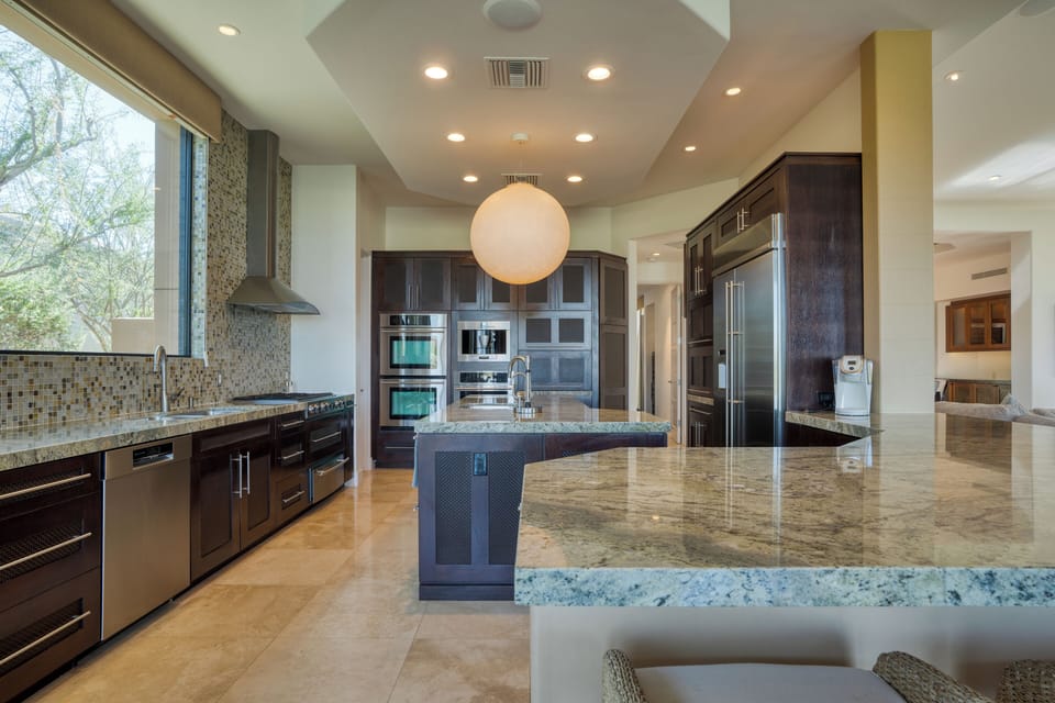 Contemporary kitchen with generous prep space and modern finishes.
