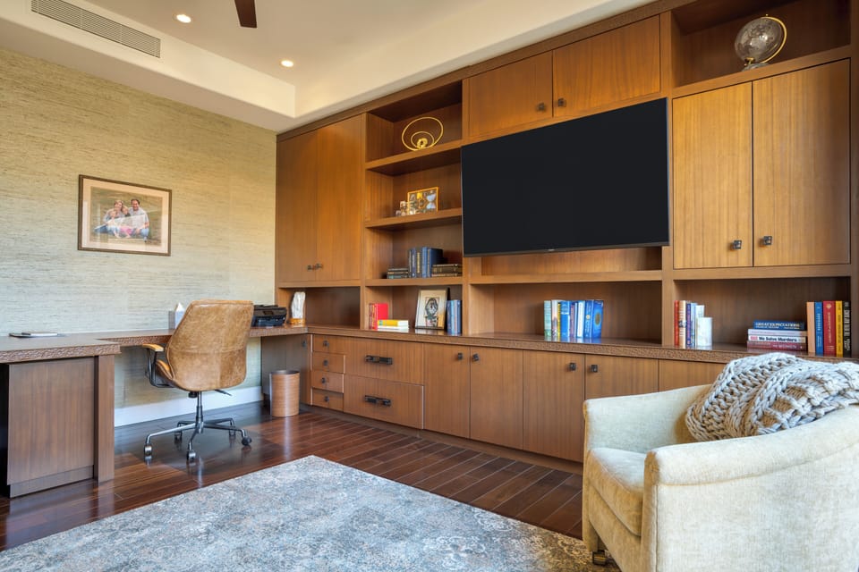 Bedroom 3 features a queen bed, TV, designated work area, and an ensuite bathroom.