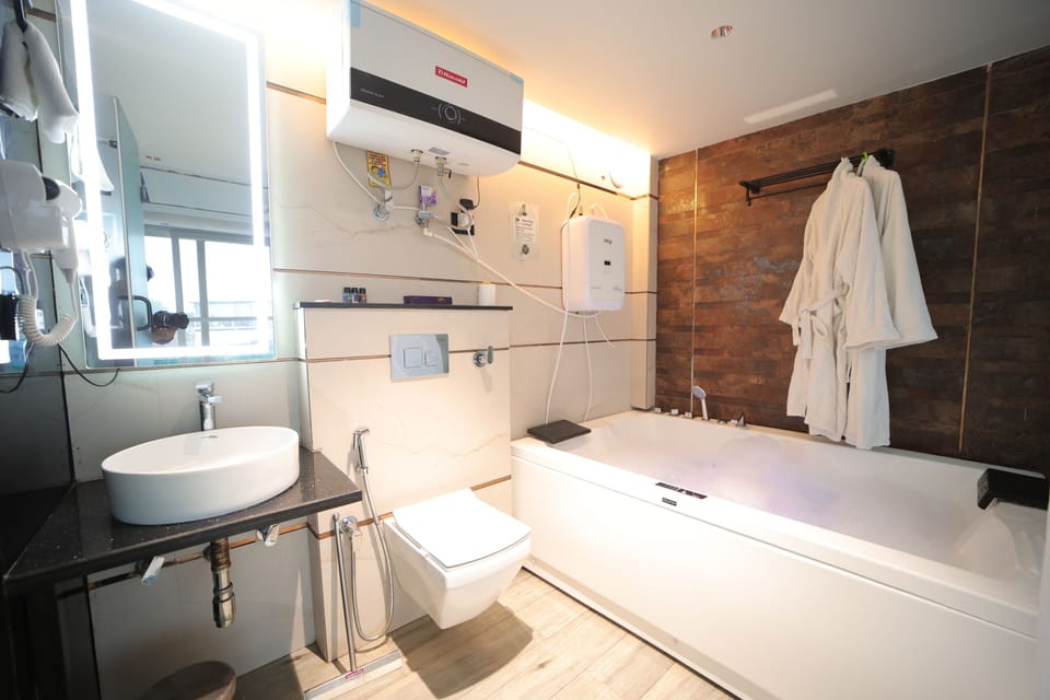 Suite, 1 Bedroom, Balcony, City View | Bathroom | Shower, free toiletries, hair dryer, slippers