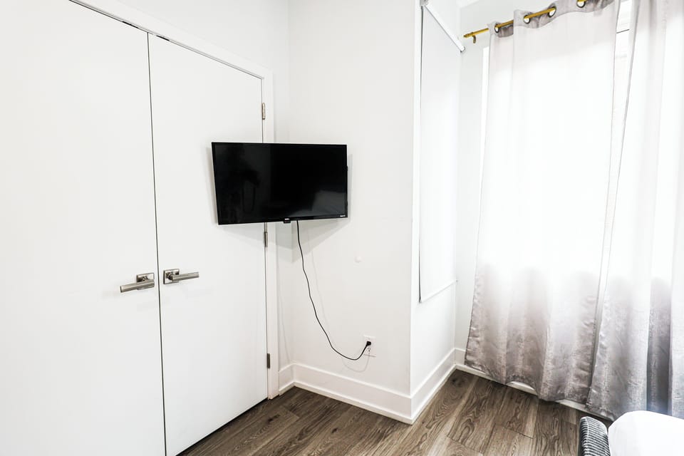 Smart TV with streaming apps for cozy movie nights.