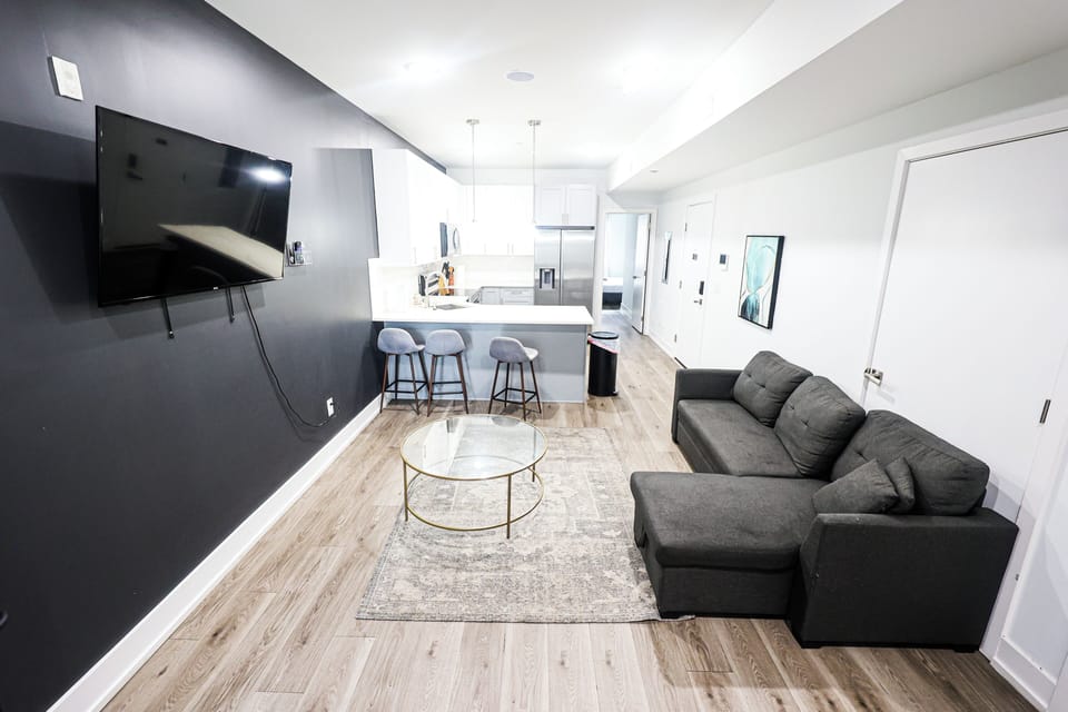 Whether you’re working remotely or just chilling, the living room offers space to relax and focus.