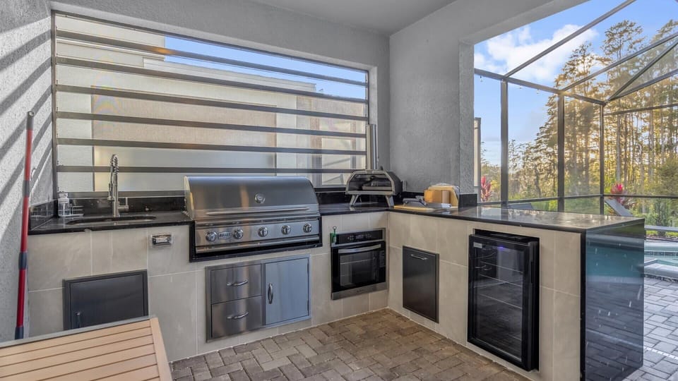 Fully Equipped Outdoor Kitchen with BBQ Grill