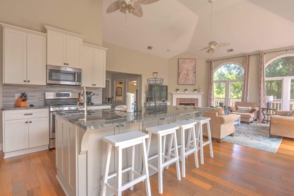 Well appointed kitchen with granite counters and stainless appliances