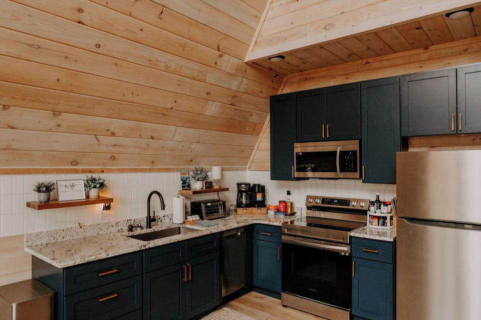 Full kitchen with stove, oven, refrigerator and freezer, dishwasher, etc