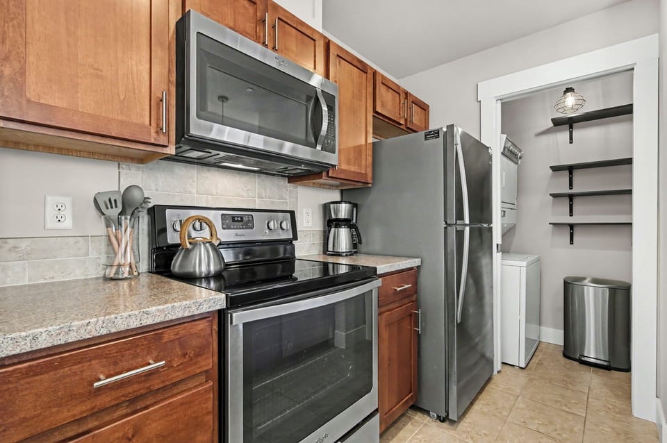 Your fully equipped kitchen features stainless steel appliances, granite counters, and everything you need to create memorable meals during your stay.