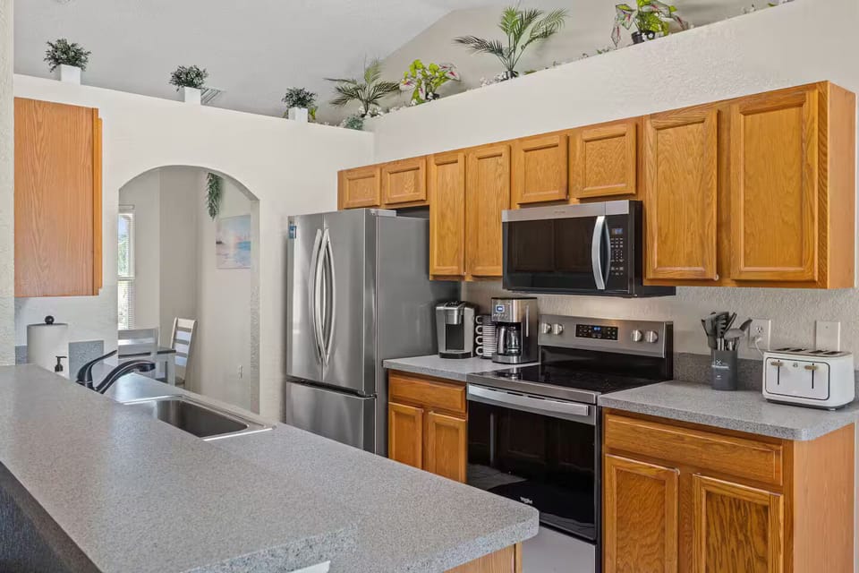 Kitchen with full size appliances and much more.