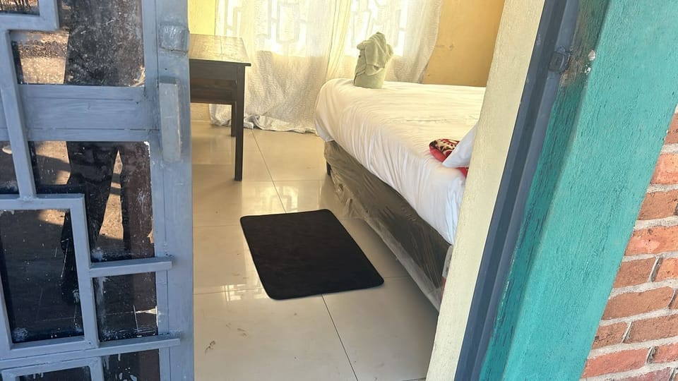 Shower, free toiletries, towels, toilet paper