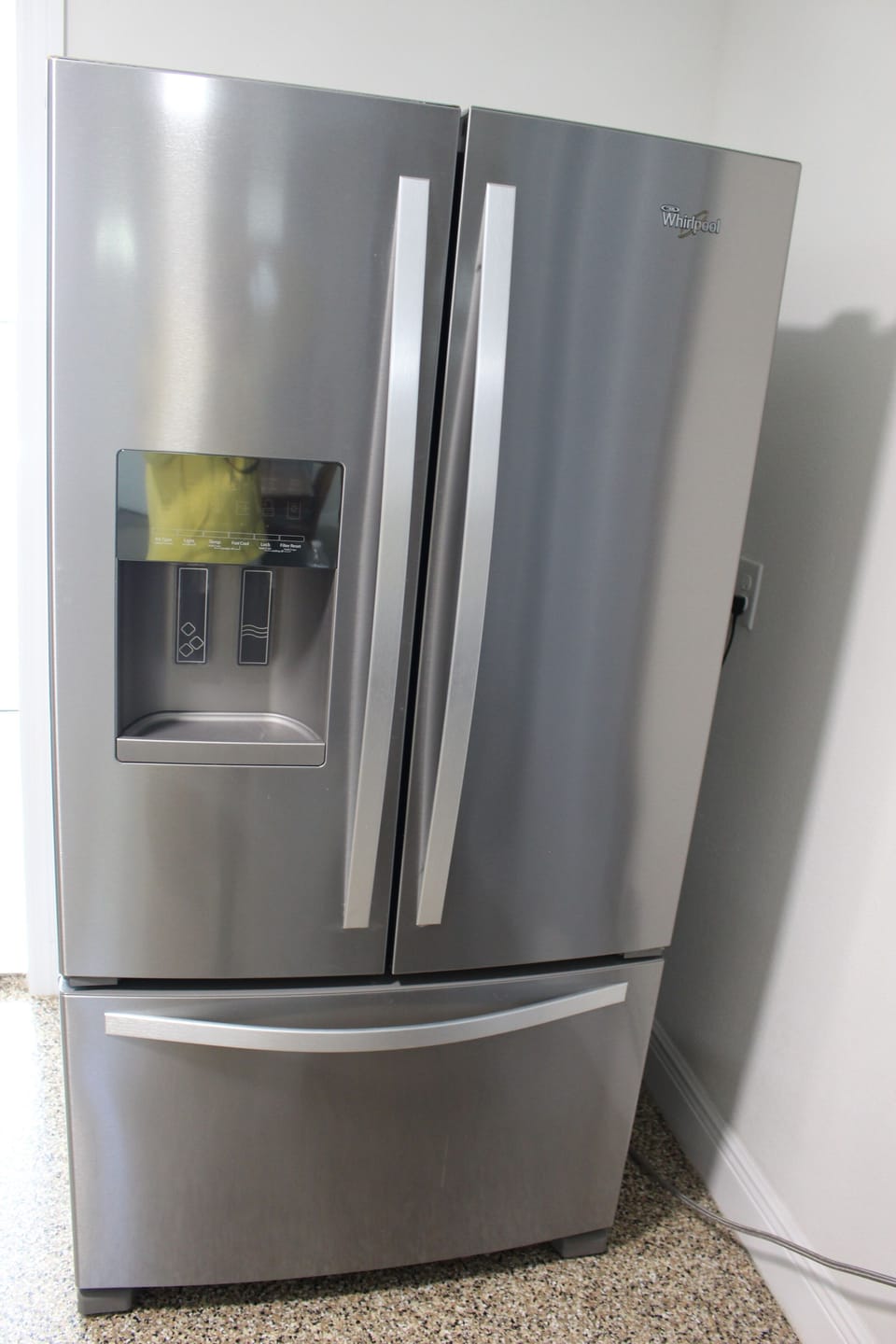 Refrigerator. It stooped to make ice. Water is ready for drink.