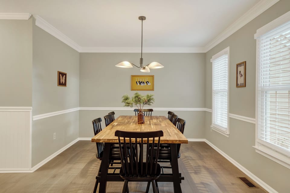 The formal dining room offers elegant seating for eight