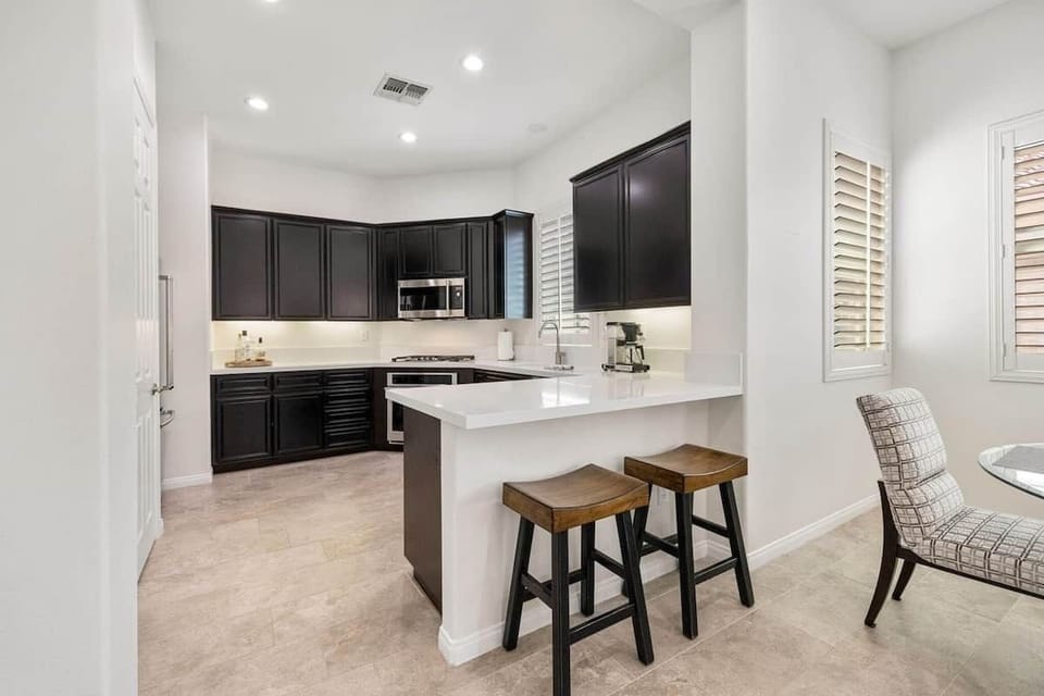 Modern and convenient, our bar and kitchen are perfect for entertaining