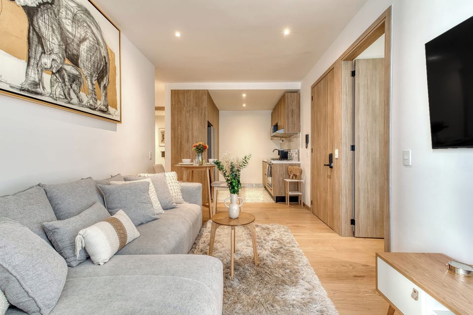 Apartment, Multiple Beds, Kitchen, City View (Unico Roma Torre Maple 302) | Living area