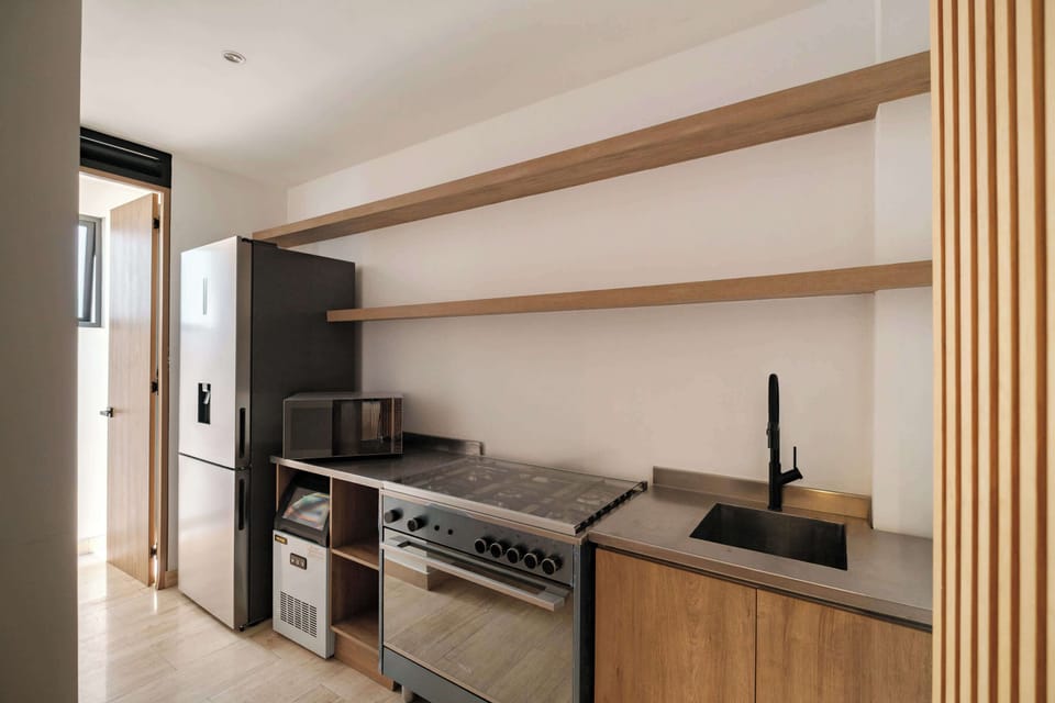 Apartment, Multiple Beds, Kitchen, City View (Unico Roma Torre Maple 302) | Private kitchen | Electric kettle