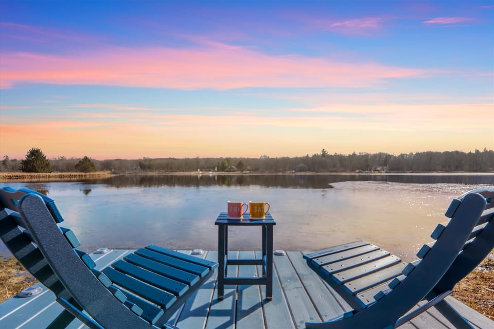 Lakefront seating with golden-hour views