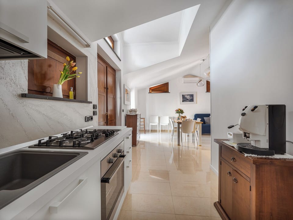 Comfort Apartment, City View | Private kitchen | Fridge, microwave, oven, stovetop