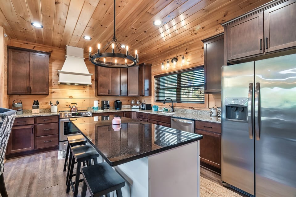 As you walk in, you will see the wide open layout with a well-equipped kitchen