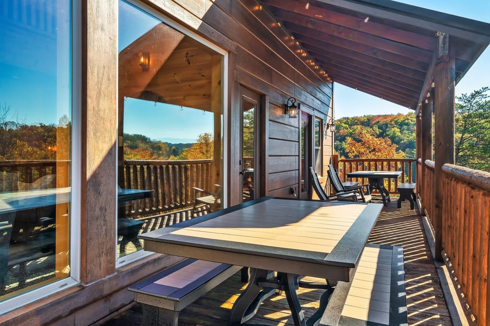 Relax at the indoor heated pool with a custom mural and large windows offering an incredible view