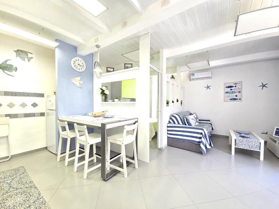 City Duplex, Partial Sea View | Living area | 40-inch Smart TV with digital channels