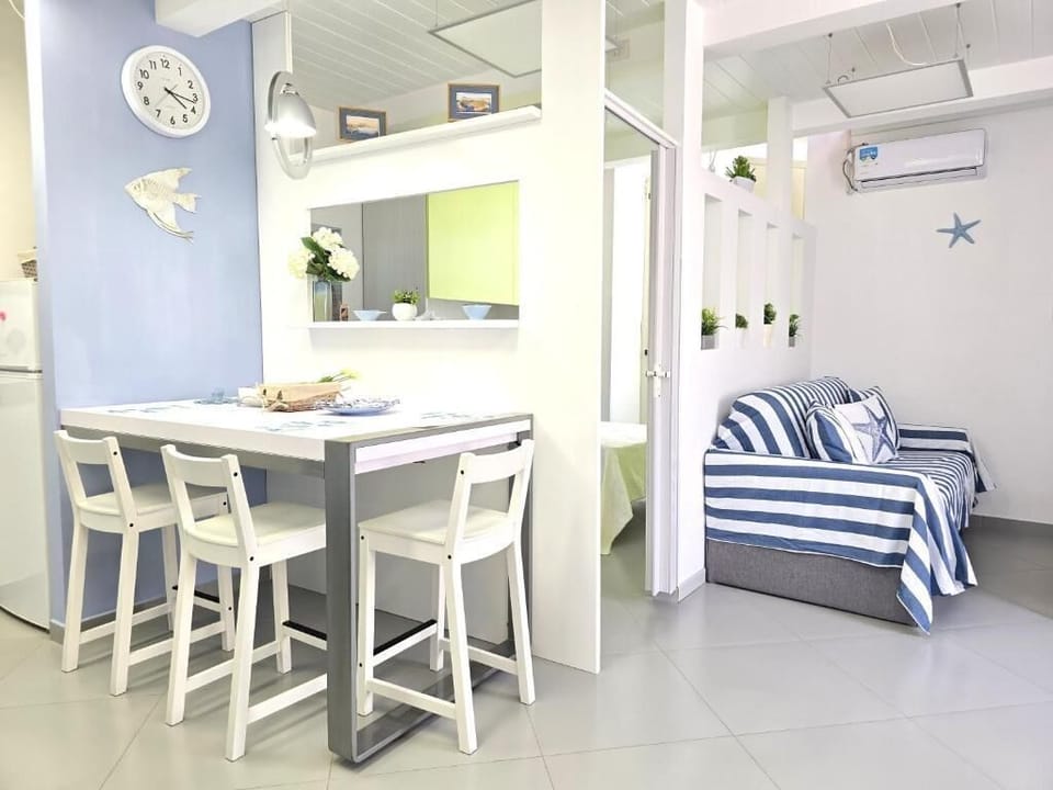 City Duplex, Partial Sea View | Living area | 40-inch Smart TV with digital channels