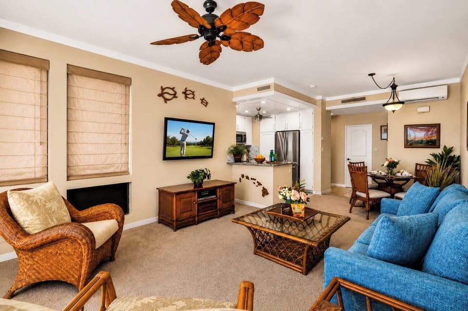 Gather in the living room, where natural light and a flat-screen TV make evenings just as inviting as the view outside. KGV-18T4