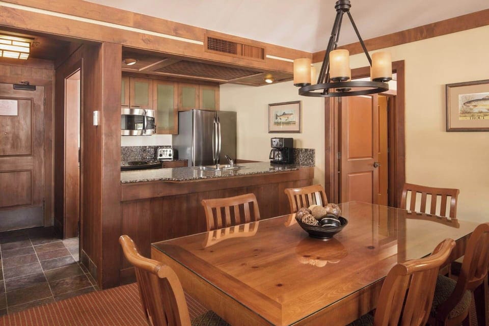 Separate Dining area and Full kitchen. Kitchen includes all the necessities to cook a meal.