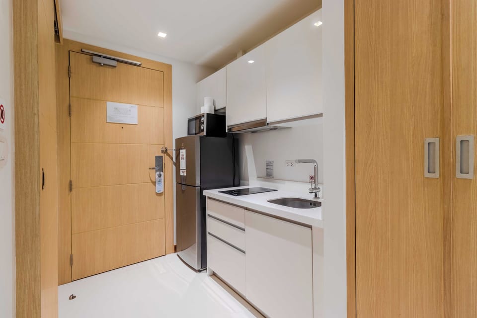 Apartment, Balcony, Pool View | Private kitchen